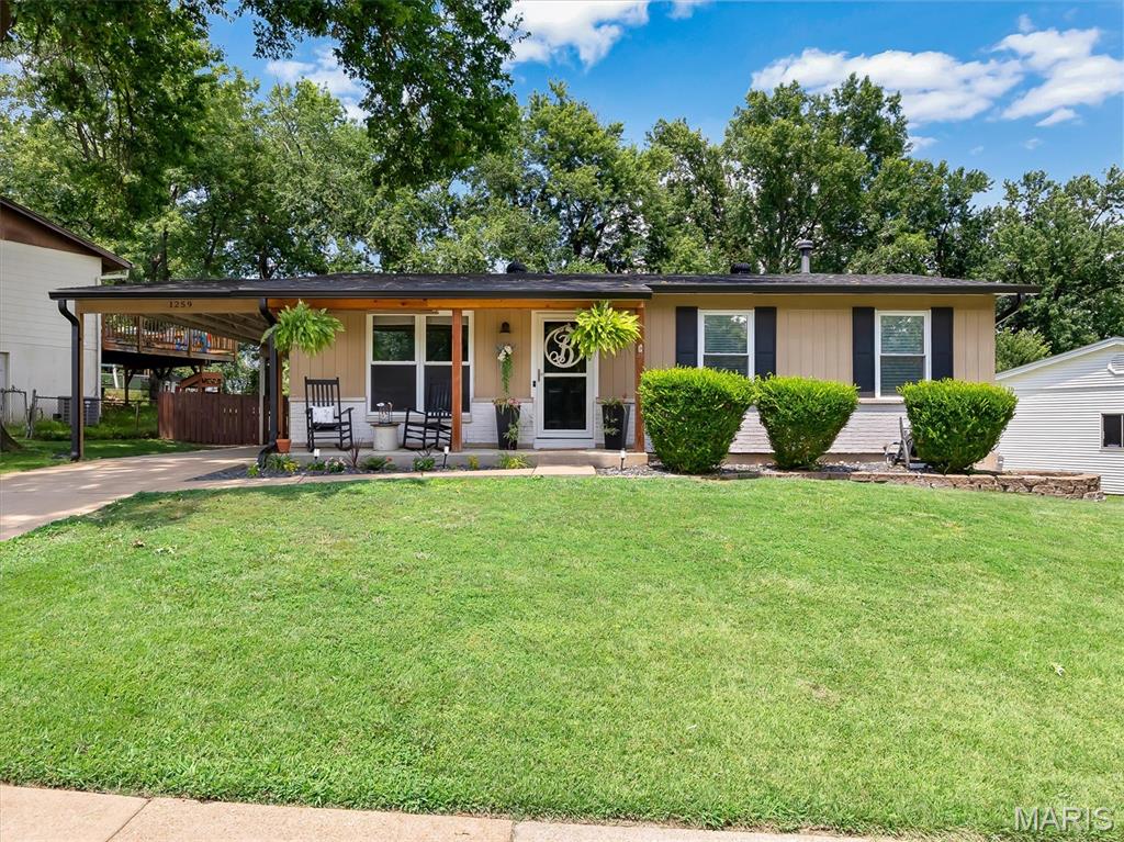 Welcome home to this 3 bedroom, 2 full bath home located in the highly sought-after Rockwood School District! This home offers hardwood floors throughout and an open kitchen with white cabinets that flows nicely into the main living space—perfect for everyday living and entertaining.

The main level features comfortable bedrooms and great natural light, while the partially finished lower level adds extra living space along with one of the full baths. This area is ideal for a second living room, playroom, home office, or workout space.

Step outside to a large, level fenced yard—perfect for kids, pets, or hosting friends and family. There’s plenty of room to relax, play, or add your own personal touch to the outdoor space.

Major updates include a new roof and gutters (May 2022), updated electric panel (2022), and a bathroom remodel completed in 2023—giving peace of mind and added value for the next owner.

Conveniently located close to shopping, restaurants, parks, and more, this home offers a great combination of location, layout, and value. Don’t miss your chance to own in Rockwood!