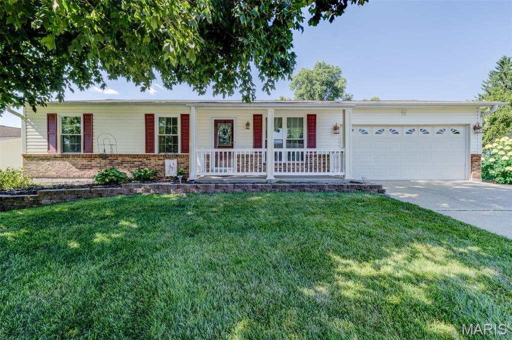 Over 1950 Sq Ft of living space with Finished Lower Level and Sun Room off the Kitchen. Speaking of the fabulous kitichen, Newer within the past 17 years along with the very bright and airy Sun Room with w/walls of windows and access to the deck and fenced backyard for pets and childs play.  Kitchen w/stunning 42' Cabinets, Solid Stone Counters, Microwave and Refrigerator, Appliance Closet, pantry, center island & Breakfast area for plenty of family meals. The Family rm & hall w/Engeneered wood floors, Large window, and ceiling fans in every room. Primary Bedroom w/ Updated Full Bath, Adult High Vanity & Lg. closet.  Updated Hall Bath. Now to the Finished Lower Level w/ Family Rm, w/Gas Fireplace, Game Rm for Pool table, half bath and a wet bar and cedar closet. White six panel doors and baseboards, Vinyl siding, facia and soffits, Tilt in windows. Garage is 21 X 18 with shelving, cabinets & exhaust fan.    
Water Heater (2024+/-), Roof 2016,A/C 2024, Furnace (2013 +/-), Deck (2012 +/-) Easy access to shopping, dining, Elementry and Sr. High School, Laurel Park, Churches, Library and major roads.