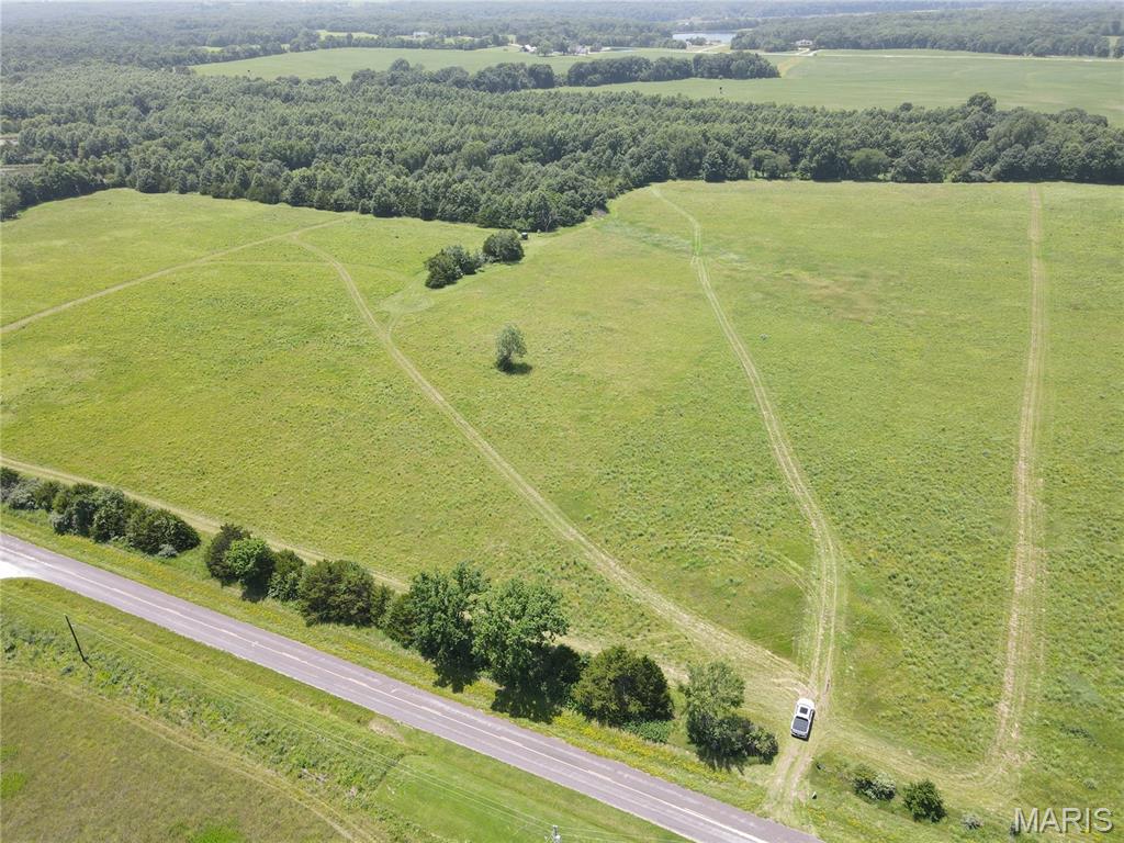 Incredible opportunity to own **10± acres in one of the most desirable Route N locations**, just 5 minutes south of Monroe City and perfectly positioned on the Indian Creek side of Mark Twain Lake! Whether you are looking for a recreational getaway, hunting tract, investment property, future homesite, or lake-area escape, this property checks all the boxes.

The land is mostly flat with a touch of gentle slope, offering a beautiful blend of open acreage and woods. Approximately 7 acres are tillable and currently in CRP, with the balance in wooded cover that attracts abundant wildlife, including whitetail deer and turkey. With an NCCPI of 61.3 and Armstrong and Mexico soil types, this tract offers strong land value in a highly sought-after area.

Rural water is available at Route N, with electric, water, and fiber available. A small amount of wetland off an inland lake adds natural character and wildlife appeal. Route N Boat Ramp is just minutes away, and Indian Creek Marina is within approximately 15 minutes, making lake access quick and convenient. The property is surrounded by open fields and wooded acreages and backs to wooded ground, creating the perfect mix of privacy, scenery, and accessibility.

Located in the Monroe City School District. Easement access will be provided. Seller is willing to subdivide and consider other acreage amounts. A rare Route N acreage like this does not come along often!