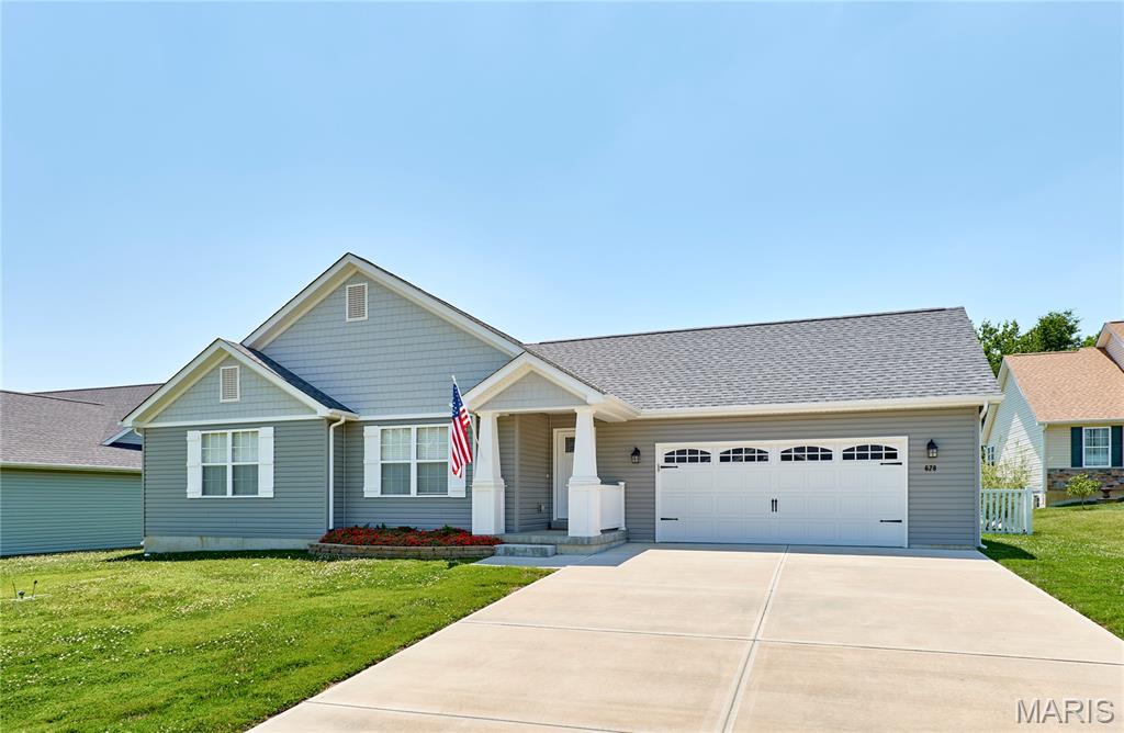 Welcome home to this beautifully maintained 4-year-old ranch in the desirable Stone Crossing subdivision! This 3-bedroom, 2-bath split-bedroom floor plan with over 1600 sq ft offers the perfect blend of comfort, style, and functionality.
Step inside to find durable luxury vinyl plank flooring throughout the main living areas, with cozy carpet in the bedrooms. The open-concept kitchen is designed for both everyday living and entertaining, featuring soft-close cabinetry, a large center island, an oversized pantry, and plenty of workspace. The spacious living room is highlighted by a warm gas fireplace, creating the perfect gathering space.
The private primary suite offers a relaxing retreat with a double vanity and a separate shower in the en-suite bath. A convenient main-floor laundry room adds to the home's practical layout.
Outside, enjoy the oversized patio overlooking the partially fenced backyard with attractive vinyl fencing—ideal for outdoor dining, relaxing, or entertaining. With modern finishes, a thoughtful floor plan, and a fantastic location, this move-in-ready home is one you won't want to miss!