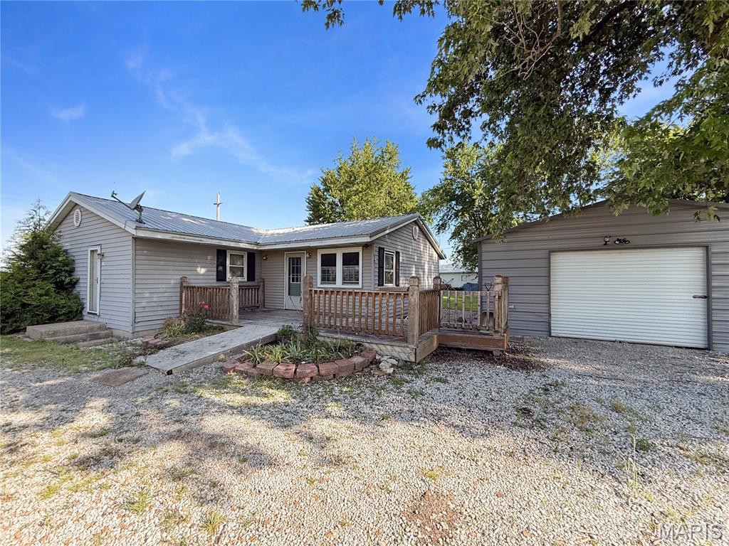 This home is full of potential and ready for someone to make it their own! Situated on a corner lot, this spacious 4-bedroom, 1-bath home offers solid bones and several major updates already completed — including a metal roof replaced in 2021 and new windows installed in 2023 throughout all but two windows in the home.
Inside, you’ll find character and charm with a wood-burning brick fireplace anchoring the living room, creating a cozy focal point for the space. Outside features a 20x20 shed/garage built just 3 years ago complete with electric and a wood-burning stove, offering the perfect workshop, hobby space, or extra storage.
With a little TLC and vision, this property could truly shine again. Whether you’re looking for an investment opportunity, fixer-upper, or a place to customize into your dream home, this one has endless potential! Home is being sold as-is.