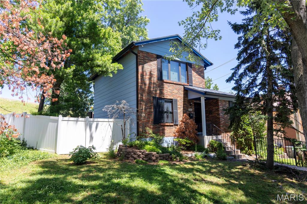 This 2-story home was built in 1983 and has a style all of its own that's unique to the area. The main level offers a spacious living room, kitchen with breakfast area and huge walk-in pantry, and a half bath.  All kitchen appliances can stay. Upstairs you'll find two spacious bedrooms and a full bath. The lower level has a finished room with a walk in closet offering additional living space.  Washer and dryer can stay as well.  Outside, enjoy the privacy of a fenced backyard with low-maintenance vinyl fencing, plus a 1-car attached garage featuring a brand-new garage door. Ample off-street parking. Major systems are already taken care of, with a newer water heater (2020) and HVAC system (2021), offering peace of mind for years to come.  Tucked into the Hi-Pointe neighborhood, this home offers unbeatable convenience, just minutes from major highways, shopping, and a great mix of restaurants.