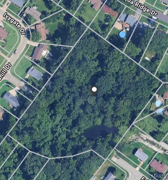 Prime Oakville Site, 3.99-Acre Wooded Parcel with Pond – Endless Potential

Discover this rare opportunity to own nearly 4 acres of untouched, wooded land featuring a scenic pond. A perfect spot to build your dream home surrounded by nature to create a private retreat.  With a peaceful setting, mature trees, and natural water features, this property is ideal for those seeking privacy, recreational use, or long-term growth. Utilities are nearby and access is convenient. Bring your vision and make this land your own!

For safety reasons, the property may be viewed and walked only after an accepted contract. The land is heavily wooded, with limited visibility and uneven terrain. Advance notice is required to coordinate safe access. This is a beautiful parcel with great potential—just requires the right preparation to explore it safely.