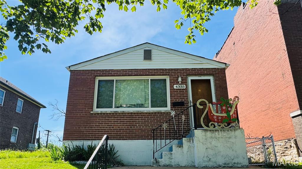 Beautiful brick bungalow conveniently located near Hwy 55 with easy access to shopping, restaurants, and downtown! This charming home offers 2+ bedrooms, 1 full bath, and a detached 2-car garage. Features include hardwood floors throughout most of the home, updated plumbing, a high-efficiency forced-air furnace 6 years old, central A/C, architecture roof 6 years old, a 100-amp electric panel,  ceiling lights and fans, and a spacious bonus room in the lower level perfect for an office, workout area, or additional living space. Enjoy the level fenced backyard ideal for entertaining, gardening, or pets. Solid brick construction with great curb appeal makes this home a fantastic opportunity for an owner-occupant or investor alike. Schedule your appointment today!