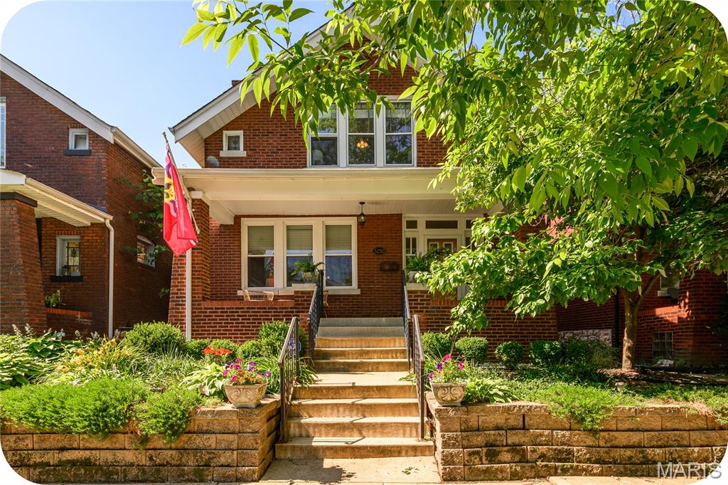 This is the home you’ve been waiting for in one of the area’s most loved neighborhoods! Walk to the Macklind Mile and enjoy favorites like Russell's on Macklind, The Mack, Onesto Pizza & Trattoria, Clementine's Naughty & Nice Creamery, and so much more!

A beautifully landscaped tiered front yard creates incredible curb appeal and welcomes you home. Relax on the large covered front porch — the perfect spot to enjoy your morning coffee and connect with neighbors.

Inside, you’ll love the charm and character throughout, including new hardwood floors, stunning stained-glass windows, and a cozy gas fireplace flanked by built-in bookshelves ready to showcase your favorite collections. The spacious dining room flows seamlessly into the updated kitchen featuring custom cabinetry and granite countertops.

Step outside to the large deck overlooking the fenced, level backyard — an ideal space for summer BBQs, gatherings with friends, and relaxing fire pit nights.

Upstairs offers three comfortable bedrooms and a full bath. The basement provides excellent storage space, a workout area, laundry, and a sump pump for added peace of mind.

This adorable home is full of warmth, charm, and wonderful spaces both inside and out. Don’t miss your chance to make it yours!