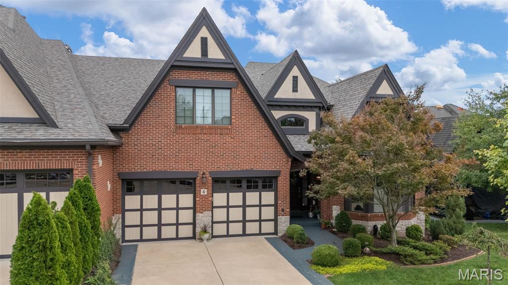 Experience elevated living in this exceptional villa, perfectly situated in one of Chesterfield’s most desirable locations. Dramatic vaulted ceilings and expansive windows create a light-filled, refined atmosphere. The gourmet kitchen is a true centerpiece, featuring beautiful custom cabinetry, granite countertops, a Sub-Zero refrigerator, and double ovens—perfectly designed for both everyday living and upscale entertaining. Thoughtfully designed with elegance and comfort in mind, this residence offers three beautifully appointed bedroom suites, each featuring a private, spa-like bathroom. The primary suite on the main level provides effortless luxury, complemented by main-floor laundry. The main level showcases rich wood flooring throughout, enhancing the home’s warmth and sophistication. An office and an elegant formal dining room provide ideal spaces for work and entertaining. Upstairs, two additional private bedroom suites offer comfort and privacy, along with a versatile den ideal for a library, sitting room, or study. The fully finished walk-out lower level is an entertainer’s retreat, complete with a custom bar, pool room, workout area, and access to a private patio. A stunning four-season room off the back of the home offers year-round enjoyment, enhanced by new skylights that fill the space with natural light Blending timeless elegance, premium finishes, and low-maintenance villa living, this remarkable home is a rare offering in the heart of Chesterfield.