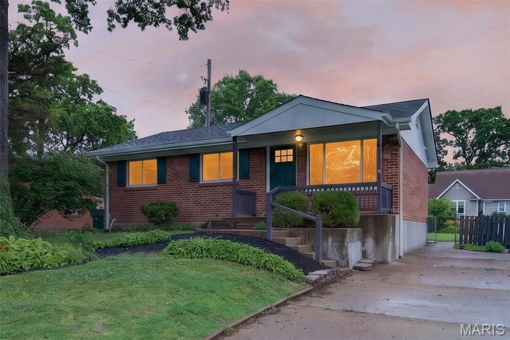 Welcome home to this extensively renovated gem in the heart of Webster Groves! Every detail has been thoughtfully updated, including a new roof, all-new flooring, lighting, fresh interior paint, beautifully remodeled bathrooms, and a stunning new kitchen. The kitchen is designed to impress with 42-inch soft-close cabinetry and drawers, stainless steel appliances, and a stylish tile backsplash. Both the full hall bathroom and the private half bath off the primary bedroom feature charming shiplap wainscoting, while tasteful accent walls add warmth and character throughout the home. The finished lower level offers exceptional additional living space with a spacious family room, recreation area, sleeping area, and full bathroom. Step outside to enjoy the deep backyard featuring a deck, patio, storage shed, and a breathtaking koi pond that creates a peaceful backyard retreat. Ideally located within walking distance of the Webster Groves Parks and Recreation Complex and just minutes from Webster University, shopping, dining, and everything that makes Webster Groves one of the area's most desirable communities.