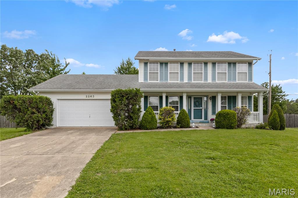 Showing start TODAY 6/25/26!! Located on a quiet O’Fallon street, this spacious four-bedroom, 2.5-bath home offers a fantastic opportunity to add your personal style while enjoying a home that is comfortable and almost move-in ready from day one. With solid bones, a desirable floor plan, and plenty of living space, this property is ready for its next chapter. The exterior features a large front yard, attractive landscaping, a welcoming front porch perfect for morning coffee, and a spacious two-car garage. A new roof will be getting installed soon! Inside, the main level offers a layout today’s buyers love, featuring a formal living room, formal dining room, and a generously sized family room highlighted by a brick fireplace and large bay window that fills the space with natural light. The kitchen provides abundant cabinetry, ample workspace, nice appliances, and a large center island, while the adjoining breakfast room creates a comfortable space for everyday dining. Just beyond, the inviting four-season room offers the perfect place to relax, entertain, or enjoy views of the backyard year-round. There is even a convenient  main floor laundry room. Upstairs, you’ll find three nicely sized guest bedrooms, a full bath, and a spacious primary suite featuring a walk-in closet, light-filled bay window, and private en suite with dual vanity, jetted soaking tub, and walk-in shower. Outside, the backyard offers plenty of room to enjoy with established landscaping and a patio perfect for gatherings. The unfinished basement provides exceptional storage and future expansion potential. All of this is conveniently located in the sought after Monticello Subdivision with great amenities, including swimming pools, a clubhouse, lakes and ponds and walking/jopgging trails. In Monticello it's not just about the house, it's about the lifestyle too!