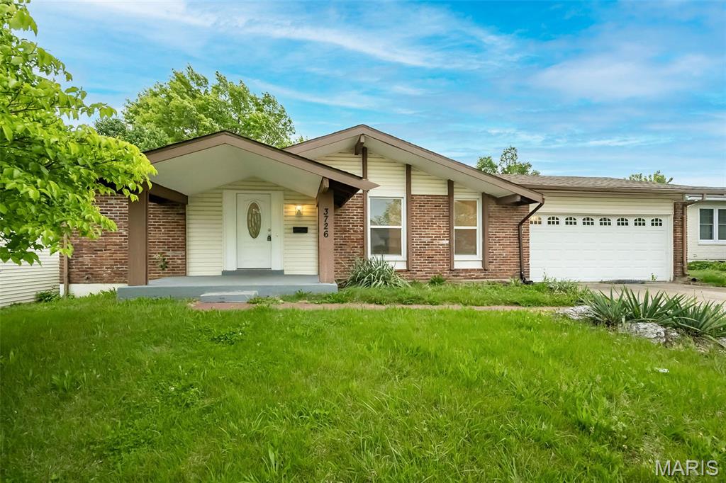 Recently painted and updated Florissant ranch offering comfortable one-level living, great entertaining space, and endless potential! Featuring 3 bedrooms, 2 full bathrooms, and over 1,200 square feet, this home sits in an established neighborhood with mature trees and convenient access to shopping, dining, parks, and highways. Inside, you’ll find a spacious layout with a cozy fireplace, generous living areas, and plenty of natural light throughout. The kitchen offers ample cabinet and counter space and flows easily into the dining area for everyday living and gatherings alike. Step outside to enjoy the large backyard with room to relax, garden, or entertain. The attached garage and lower-level space provide extra storage and flexibility for hobbies, recreation, or future finishing opportunities. Whether you're a first-time buyer, downsizing, or adding to your investment portfolio, this home is packed with value and opportunity!