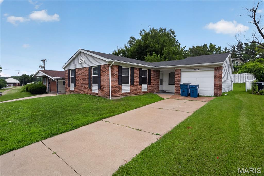 Welcome to 2583 Robley DR, STLS MO 63136, a ready-to-move-in single-family residence built in 1964, offering an inviting home experience. This ranch-style property provides a comfortable and convenient lifestyle, designed for effortless living. The heart of this home is its kitchen, thoughtfully appointed with matching black appliances, creating a cohesive and functional space for culinary endeavors. Beyond the main living areas, discover three comfortable bedrooms and a well-appointed bathroom. The property also includes a versatile basement, offering additional space for storage or future customization. Enjoy the tranquility of a private yard, perfect for outdoor relaxation or entertaining. An attached garage provides convenience and secure parking. Experience the ease and charm of this home – schedule your private viewing today.