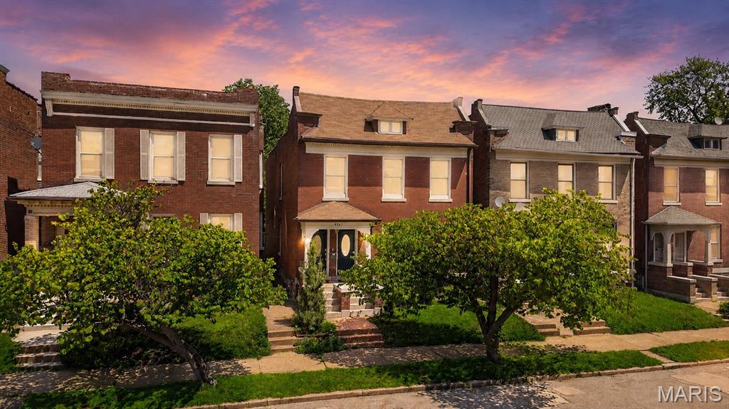 Enjoy the perfect blend of historic charm and modern updates in this beautifully renovated 2-story home located in the highly sought-after Shaw neighborhood. Featuring 4 bedrooms and 3 full baths, this home offers character-filled living with today’s conveniences, including wood flooring, custom shutters, granite countertops, and beautifully updated bathrooms with marble and subway tile finishes. Relax on the covered front porch or unwind on the spacious upper-level deck just off the primary bedroom, the perfect spot to start your morning! The secluded fenced yard offers plenty of room for pets, outdoor entertaining, gardening, or simply unwinding in your own outdoor retreat. The 2-car garage provides ample parking, storage, and protection from the elements. If you're looking for extra space and functionality, this property delivers everything you need to feel right at home! It doesn't end with this gorgeous home though .. step outside and experience everything Shaw Living has to offer! Walk to local restaurants, bars, coffee shops, and food trucks, or spend Saturdays exploring the Tower Grove Farmers’ Market in nearby Tower Grove Park, just a short walk away. This home is also just 3 miles from Barnes-Jewish Hospital and Washington University, 1 mile from SLU Hospital and SSM, 5 miles from downtown STL, and steps away from the iconic Missouri Botanical Gardens making this location truly unbeatable!