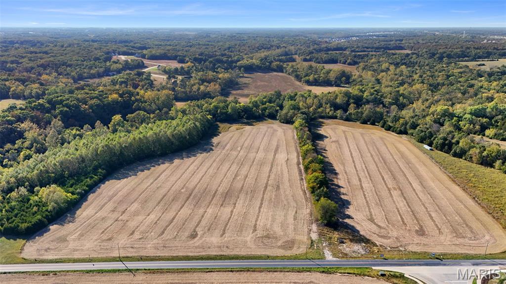 Incredible commercial opportunity! 34.5+/- acres at Schaper Rd and Interstate Dr, positioned at the site of the new St. Charles Community College Western Campus project. The planned Interstate Dr extension is expected to run along the northern section of the property, creating valuable frontage on both Schaper Rd and the future Interstate Dr. With its prime location and high visibility, this property offers excellent potential for future development subject to zoning regulations. St. Charles County Master Plan included in supplements. Don’t miss this chance to secure a key spot in a rapidly growing area! Duplicate listing MLS#25007560