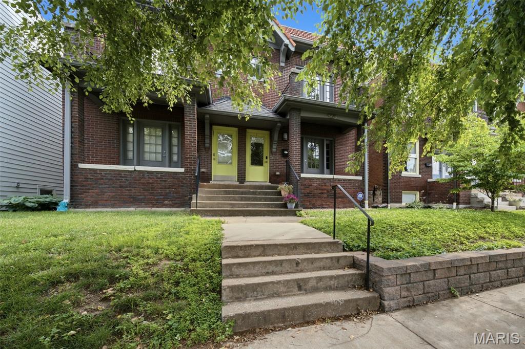 (c.) 1916: Welcome to this beautifully updated historic townhome in the center of one of St. Louis’ most livable urban neighborhood! This sharp centrally located Botanical Heights home features the magic equation that everyone hopes for = 3 bedrooms + 2.5 bathrooms + 2-car garage + main floor laundry + updated systems & more! Plus, great extras such as energy-efficient geothermal HVAC, newer windows, new water heater, ELFA closet organizers & so much more! Featuring a lovely covered front porch, step inside to find wood floors & period-appropriate millwork throughout main floor which offers a great floorplan: formal living room w/glass front built-in bookshelves, a formal dining room with a great new built-in beverage bar area, open to a modern, updated kitchen with granite counters, breakfast bar, pantry & GE Cafe appliances (plus a new SS dishwasher). A separate mudroom — which also offers main floor laundry hookups, if desired — and a half bath complete the main floor. Upstairs, find 3 great bedrooms — each with generous closets — and 2 full bathrooms. This includes a true primary suite w/pvt full bath & walk-in closet. The front bedroom offers a private balcony & walk-in closet, too! A full unfinished walk-out basement (offering tons of storage and a 2nd washer/dryer hookup) leads out to your low-maintenance, privacy-fenced, shaded backyard & spacious 2-car garage w/opener. New connection to the Great Rivers Greenway just at the corner, almost complete! Walk down the block to Taco Buddha, Union Loafers, No Ordinary Rabbit, AO&Co & more! Plus, you're just around the corner from Missouri Botanical Garden & Tower Grove Park (aka Food Truck Friday's and the great Farmer's Market), too! SO MUCH TO LOVE HERE!!