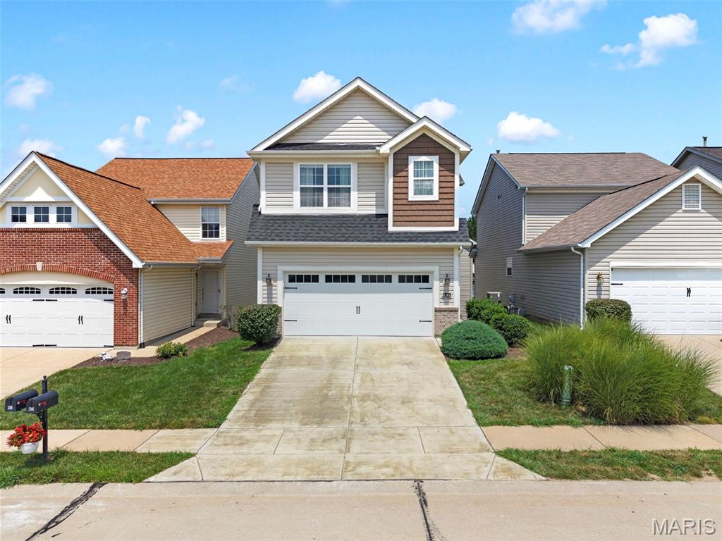 Welcome home to this exceptional 4-bedroom, 3-bath residence in the heart of St. Peters, Missouri, where thoughtful design, luxury finishes, and spacious living come together beautifully.

Step inside to an open-concept floor plan that's perfect for both everyday living and entertaining. The heart of the home is a chef's kitchen featuring premium finishes, abundant workspace, and a seamless flow into the dining and living areas, creating an inviting atmosphere for gatherings of any size.

Upstairs, you'll find two versatile loft spaces, offering endless possibilities for a home office, media room, playroom, fitness area, or additional living space.

The finished walk-out basement expands your living area and provides the perfect setting for entertaining, relaxing, or hosting overnight guests, with direct access to the backyard.

Every detail of this home showcases incredible craftsmanship and modern style, making it truly move-in ready. With spacious bedrooms, three full bathrooms, elegant finishes throughout, and an ideal layout for today's lifestyle, this home offers the perfect blend of comfort, sophistication, and functionality.

Don't miss your opportunity to own this remarkable home in one of St. Peters' most desirable locations!