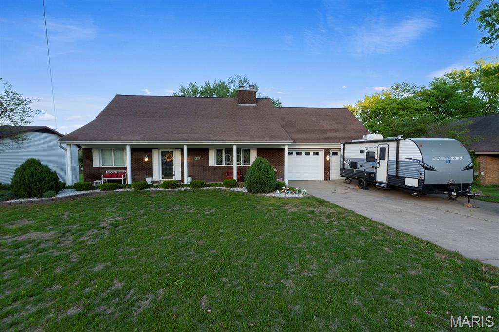 This thoughtfully designed home offers exceptional versatility and privacy across three levels. The beautifully landscaped backyard provides a serene setting, with the property extending beyond the creek to a flat, usable area. The upper level features two bedrooms, one bath, and a bonus room above the garage. The main level includes a bedroom, full bath, separate dining room, kitchen, living room, and family room, enhanced by two new electric fireplaces. The walk-out basement is spacious and well-equipped with a kitchen, bath, fireplace, two large rooms, ample storage, and a John Deere room—ideal for extended family, independent living, or rental potential. Recent updates include a new HVAC system (August 2023), a remodeled first-floor bathroom, and a new dishwasher.  Price $10,000 below appraisal.