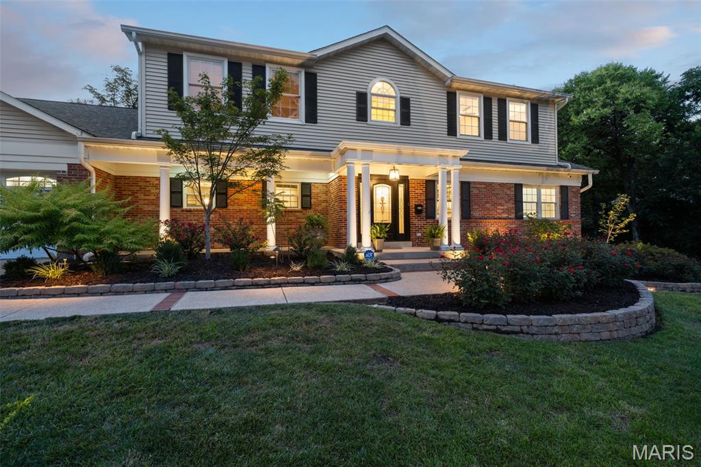 Welcome to this beautifully updated Glendale home! With 4 spacious bedrooms including a luxurious Main-Floor primary suite featuring a spa-like en suite & walk-in closet, this home blends comfort & style at every turn. Fresh Paint & New Hardwoods extend throughout the main level, adding warmth & elegance to the inviting layout. The kitchen opens seamlessly into the massive living room, creating the perfect space for gatherings. In the kitchen, you’ll find granite counters, stainless appliances, a gas range w/ double ovens, & ample storage. The Great Rm impresses w/ soaring ceilings, a gorgeous double-sided fireplace, a built-in wet bar for entertaining, & walls of windows framing the backyard views. Just off the garage, the Main-Floor Laundry/mudrm offer a convenient drop zone w/ separate entry from the back/side yard, built-in storage, & a private tucked-away office space. From the Great room, step out to a wraparound covered deck , built-in gas BBQ, & level yard ideal for entertaining or play. Upstairs find 3 generous bedrooms with new carpet and 2 full baths—one en suite bedroom. The Bright finished LL is designed for fun with a media area, 2nd wet bar, full bath, & light-filled office. So many amazing updates, including a new roof, this home practically looks & feels like new construction & is totally move-in ready.  Located on almost One acre with Fresh landscaping, & abundant curb appeal, & this home truly has it all. A rare find in Glendale/Kirkwood Schools!
