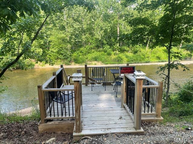 CASTOR RIVER FRONT LOT! 

Escape to the beauty of the Castor River with this riverfront lot featuring electric, water, and septic already in place! With county road frontage and easy access, this property is ready for your camper, weekend getaway, or future cabin.

Enjoy everything the spring-fed Castor River has to offer:
 Fishing
 Swimming
 Floating
 Camping
 Relaxing by the water

Imagine spending your evenings listening to the peaceful sounds of the river while surrounded by nature. Whether you're looking for a private retreat, a family camping spot, or a place to build your dream cabin, this property offers endless possibilities.

Conveniently located just north of Marquand, Missouri, and only about 1.5 hours south of St. Louis.

Don't miss this opportunity to own your own piece of riverfront paradise!