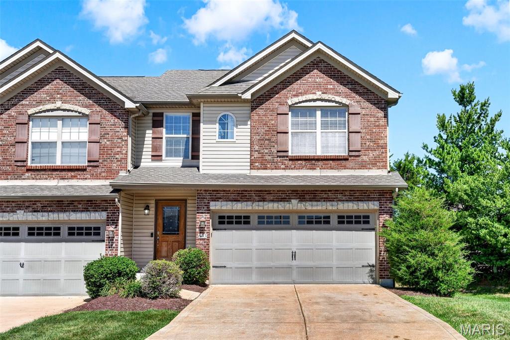 Welcome to this 3 bedroom, 4 bath (2/2), townhome in a wonderful, easy access Wentzville location! This Intimate community is located near shopping, restaurants, services and has easy access to Hwy 70 and 40/61. Offering 1,787 sq ft of finished living space, this townhome has a 2 car garage, full basement with egress and half bath, convenient second floor laundry, gas fireplace and a deck and for outdoor enjoyment. The exterior is timeless with brick, stone accents, a brick threshold, architectural shingles, carriage style garage doors, address stone, enclosed fascia/soffits, garage coach lights, vinyl siding, lawn irrigation and landscape. The main floor has a Living/Family Room, Kitchen, Dining area and Powder Room. The upstairs features a Primary Suite with vaulted ceiling, walk in closet and full bathroom with a soaking tub and separate glass enclosed shower. There are 2 additional bedrooms and a secondary bath along with a convenient second floor laundry room. Features include st steel appliances, smooth top stove, microwave, dishwasher, refrigerator, breakfast bar, wood cabinets, ceiling fans, walk in closet in one of the secondary bedrooms, recessed lighting, an attached 2 car garage, fully drywalled garage with opener and more. The finished lower level has an egress window, large Rec Room. A monthly fee pays for lawn and landscape maintenance, lawn irrigation, generous insurance coverage (per HOA Memorandum, available upon request), some exterior maintenance (brick-siding-roof-front door) and snow removal (per Indentures). Note: There is no annual fee, only a monthly fee. This low-maintenance living Wentzville Townhome has so much to love!