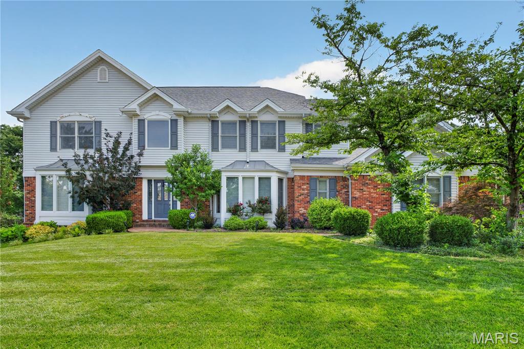 Stunning 5 BD, 4.5 Bath two-story home in sought-after Seasons at Schoettler offers exceptional living space, timeless craftsmanship, & premium amenities. Wood flrs, exquisite millwork, & updates make this home a true standout. Main level features formal LR & DR, spacious family room with FP, wet bar, chef?s kitchen loaded with high-end finishes & modern conveniences. Bright breakfast area opens to a vaulted hearth room with a 2nd FP, creating the perfect gathering space. Main-floor laundry & powder room complete the level. 2nd floor offers expansive primary suite featuring a beautifully updated luxury bath & walk-in closet. 3 more bdrms, including one with en-suite bath, plus full hall bath. Walkout LL offers endless possibilities with large rec room with a bar, exercise room, 5th bedroom, & 4th full bath, along with excellent storage space. Outdoor living is equally impressive, with large composite deck overlooking the backyard complete with newer paver patio & private putting green.