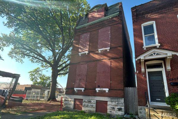 Calling all Rehabbers! This 2.5 story, historic home located on the border between the Fox Park & Tower Grove East neighborhoods is seeking caring and capable hands to restore it to its former glory. The home needs EVERYTHING so the rehab is not for the faint of heart but the payoff for your sweat equity is there. To help with repair costs, the renovation of this home may qualify for Historic Tax Credits. As part of the requirements for Seller's acceptance of an offer, the Buyer must submit their renovation plan, proposed budget, and estimated timeline for completion.