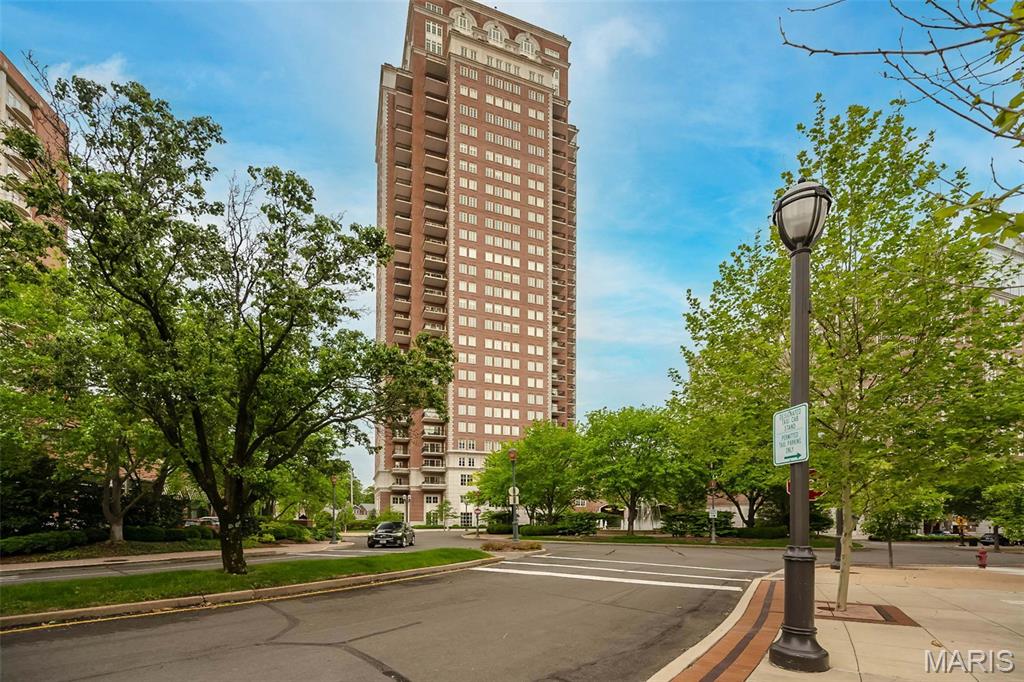 Experience elevated living at the most coveted address in town- The Plaza in Clayton. This spacious 13th floor two bedroom, two and a half bath residence features four private balconies with north, west, and south views.  The gracious  foyer opens to the living room, lovely dining room and large eat in kitchen with island featuring custom Markway cabinetry , granite countertops, 48" side by side Sub Zero,  Miele dishwasher, Wolf oven,  warming drawer,  Wolf 5 burner gas cooktop with hood,  bar sink, beverage refrigerator and breakfast room with great views.  Across from the kitchen, the cozy family room has a wall of built-in bookcases and a nice laundry room with lots of good storage.   Down the hall find the primary suite with a sitting room, two balconies, spacious his/her closets, lovely bath with large walk in shower, soaking tub and two vanities . 
The guest bedroom has an ensuite bath and custom closet.  Across the hall is a fabulous office with built in desk, cabinets, large closet and incredible views.  Large coat closet and charming powder room off the entry hall.  Also included is a storage unit and two assigned parking spaces.  This is a full-service building with 24-hour concierge, beautiful formal areas, valet,  pool,  fitness center and dog park, in the heart of Clayton surrounded by shops and restaurants.   There is a $65 monthly fee for gas.