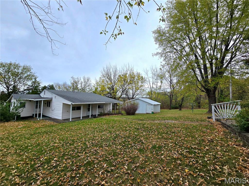 Discover exceptional potential in the heart of Potosi.  This charming 2 bedroom, 1 bathroom home (plus a bonus room) built in 1954 boast approximately 1,080 sq ft with a partial basement and sits on 4.36 acres. While many original features remain, this home has great bones and is an ideal canvas for modernization or redevelopment. Located within city limits, the property currently uses septic and well but comes with the option to connect to public water/sewer, maximizing flexibility for future use. Positioned directly adjacent to a major heath care center, down the road from the hospital, Walmart Supercenter and senior housing, this site already benefits from strong neighborhood amenities and built-in market demand. In addition, what truly sets this offering apart is its commercial and redevelopment potential: imagine converted condos, apartments, small businesses, additional senior living units, medical offices or mixed-use housing with the acreage giving you additional space to expand. Plus, while not yet complete, regional transportation and highway improvements are being actively planned in this region of MO, which could increase traffic flow and accessibility through Potosi and further elevate value! We are an Enhanced Enterprise Zone with an IDA Department that focuses on several grants and incentives, tax benefits and financial assistance for job producing companies that come to our area. This is a rare opportunity to invest today in a property poised for tomorrow. Potosi also boast an industrial park, a recent expansion of Purcell Tire and a recent Community Development Block Grant. A solid home, flexible utility connections, strong location next to key services, and acreage in a market where infrastructure growth is on the horizon. Whether you are a savvy developer, investor, or homeowner looking for room to grow, this property is uniquely positioned for both owner-occupier with long-erm growth or an investor/developer seeking additional value. Act now while the possibilities are still wide open. Contact me today for a tour and to discuss how this property can align with your vision. Don't miss this one-of-a-kind site!