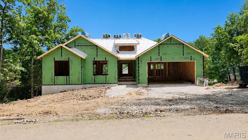 Welcome to this New Construction home in Summer Set Lake.  Hurry and you can pick out some of your own touches.  This home features an open floor plan , Vaulted Ceiling, main floor laundry, custome cabinets, stainless stell appliances, luxury vinyl flooring, granite counter top, composite deck, stamped concrete, attached 22x22 garage, corner lot, walk in shower, double vanity and large walk in closet.  Modern black gutters and windows.  Enjoy comfort and luxury perfectly nestled on a corner lot.  This community offers a location great for outdoor enjoyment with 3 lakes and beach access along with a great picnic area, great for walking and biking and a community campground.  Many family memories ready to be made here.  And a brand new home to make your own.