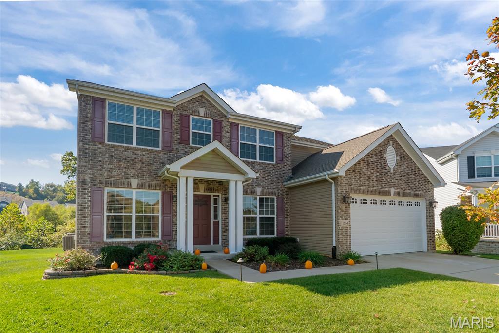 Set on a quiet cul-de-sac in the highly desirable Windings Bluffs neighborhood, this 5bd/3.5ba home provides more than you could ever imagine! Enter the spacious foyer and admire the soaring ceilings, open view from the front of the home to the back of the home, and the two flexible front rooms perfect for dining, home office, playroom, or formal living area. The large family room allows versatility with furniture arrangement, tall windows letting in natural light, and a great view of the mostly private backyard. A gorgeous, wide staircase separates the family room and kitchen, but offers views into each other through the custom metal balusters. The large eat-in kitchen has a granite island perfect for casual meals and/or entertaining, along with an abundance of matching granite counter space behind it for prepping and hosting large kitchen appliances. Custom painted cabinetry, stainless steel appliances including gas range and separate double oven, as well as refrigerator and a step-in pantry complete this space. The laundry room has a custom made cubby and granite counter for folding and temporary laundry storage. The upstairs hosts four bedrooms including what may just be the largest primary suite you'll find in your home search! The primary suite includes a walk-in closet and en suite with double vanity and separate tub/shower. Three additional spacious bedrooms each with ample closet space, and a hall bath complete the upstairs. In the basement you'll find a finished rec area, as well as a proper basement bedroom with egress window and walk-in closet, as well as a full bathroom with custom tile work. Plenty of storage in the unfinished area and a deep pour make this the ideal newer construction basement! The backyard is a retreat with custom patio and fire pit,  landscape lighting for night time hangs, as well as a flat back yard that leads to landscaping beds and a custom stone staircase down to the neighborhood walking trail. The yard and landscaping stay lush with the irrigation system! The neighborhood is perfect for the active owners, with a walking trail loop that is just down the hill from the backyard's custom stone steps, pickleball courts, field, basketball court, and two ponds you may throw a line in, as well as walkability to the elementary school!