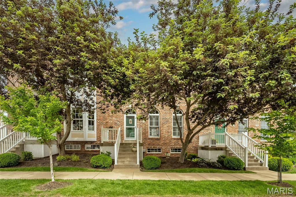 Welcome Home to Luxury, Comfort & Carefree Living! Nestled in the prestigious Cambury Subdivision in the heart of Wildwood, this stunning 3-bedroom, 2.5-bath townhome with an oversized attached 2-car garage is loaded with high-quality updates, impeccable pride of ownership, and pristine condition—bursting with Character & Style! Elegant open and flowing floor plan showcases soaring 10’ ceilings, Plantation Shutters, Custom Blinds, Anderson Tilt-In Windows & Transoms Windows, 2-panel Colonial doors, recessed lighting, and upgraded Stainmaster carpeting in 2017 throughout the main level. Stunning Gourmet Kitchen remodeled in 2019 with over $17K in quality upgrades featuring gorgeous 42” soft-close cabinetry with crown molding, quartz countertops, stylish bar pendant lighting, stainless steel sink with gooseneck faucet, hardwired under-cabinet lighting, recessed lights, and stainless steel appliances including a Bosch refrigerator & dishwasher and Samsung electric range & microwave. Adjoining dining area leads to a private covered deck overlooking the common ground with additional storage—perfect for relaxing or entertaining! Upstairs offers 9’ ceilings, a spacious primary suite with walk-in closet plus additional closet space, updated vanity, shower, and newer light fixture. Two additional generously sized bedrooms, full bath, and a convenient second-floor laundry complete the upper level. Enjoy carefree living at its finest in an unbeatable Wildwood location—offering the perfect blend of elegance, comfort, and low-maintenance living. Truly the best of both worlds!