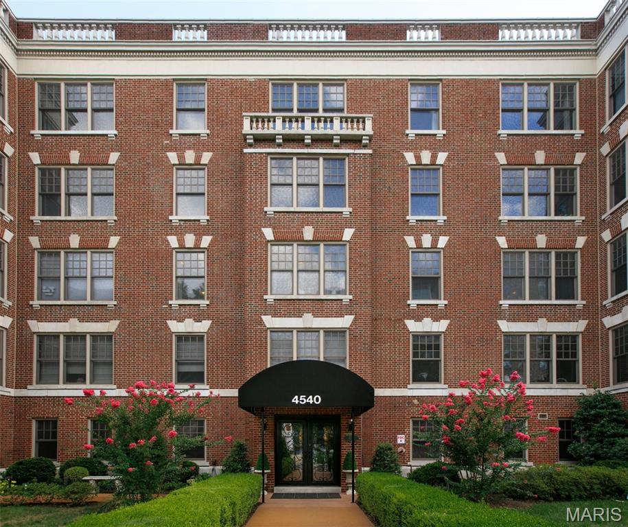 The Netherby Hall is a boutique building affording discretion and privacy on Lindell Boulevard in the heart of the Central West End!  The (private to this unit) wrap around rooftop terrace is unlike any other in the area.  This inviting space features plenty of room to relax, lounge, grill, dine and entertain above the hustle and bustle of the city below.  Inside you will be greeted with majestic spaces.  An expansive open concept living area feels comfortable, light and airy with abundant windows, 10' ceilings and is anchored by a gorgeous floating curved staircase with wrought iron balustrades.   There is a handsome study with wrap around windows and gorgeous floor to ceiling custom built in cabinetry.  A secluded guest suite and charming powder room round out the main floor.  Upstairs you are greeted by the most convenient cafe and bar area serving the primary suite and terrace – perfect for morning coffee, an afternoon nosh and rooftop parties.  The primary suite offers tranquil sophistication with wrap around French doors to capture morning sunrises and a cozy lounge area with a gas fireplace.  The ensuite was just finished - impeccably designed and appointed in tasteful designer finishes.  Two secured parking spaces ensure convenience and security.  Truly a special place you will be thrilled to come home to every day!