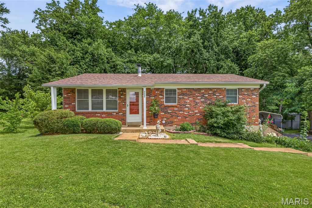 Welcome home to this charming 4-bedroom, 1.5-bath ranch offering comfort, space, and incredible value! The bright, open floor plan creates an inviting atmosphere, while the spacious living room features a cozy wood-burning stove perfect for relaxing evenings. The kitchen walks out to a newly updated covered deck overlooking a private, picturesque backyard that backs to woods, providing a peaceful setting to enjoy your morning coffee or entertain guests. Recent updates include some newer windows and window treatments, newer storm door, newer flooring in living room, family room in lower level, hall and bathrooms, newer hot water heater, new roof, giving buyers added peace of mind. Ceiling fans throughout help keep the home comfortable year-round. The partially finished lower level offers additional living space with endless possibilities for kids play area, home office, or rec area. Step outside and enjoy both the covered deck and backyard patio, perfect for outdoor gatherings. Conveniently located near schools and offered at an attractive price point, this home is the perfect opportunity for first-time buyers, growing families, or anyone looking for a move-in-ready home with plenty of charm. Don’t miss your chance to make this wonderful home yours—schedule your private tour today!
