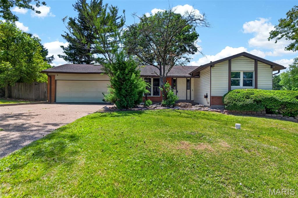 Nestled in the highly sought-after Pattonville School District, this charming home sits on a spacious corner lot and offers a backyard that feels like your own private English garden retreat. Enjoy a fully fenced yard complete with a beautiful patio and garden shed, perfect for morning coffee, entertaining, or simply unwinding outdoors.
Inside, the main level features three bedrooms, a formal living room, and a spacious eat-in kitchen with plenty of room to gather. The walkout lower level offers endless flexibility with abundant storage, a bar area, two separate gathering spaces, a full bath and an additional sleeping area ... ideal for overnight guests, hobbies, movie nights, or entertaining.
With character, space, and a setting that feels like a hidden escape while staying close to everything, this one is ready to welcome you home.