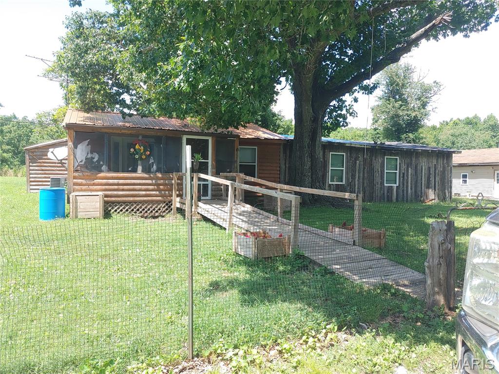 For Sale:  Unique opportunity--2/3bedroom homes on 5.56 country acres.  Both homes are in need of some TLC.  Fix up one to live in and the other for the mother-in-law or as rental property.  Lots of construction material for finishing will be left by owner.  Property also feature a large barn, storm shelter with storage building over and a pump house.  Homes will be sold as is and owner will not agree to any repairs.  Home #1 is partially finished and livable but will need some finishing.  House #2 needs more as plumbing has been removed to be replaced but never finished. #2 could also be easily converted to a large garage.  Make your appointment today as this opportunities like this do not come around often.