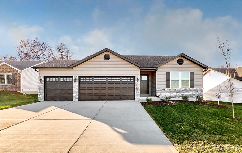 BRAND NEW home with every option you could imagine! They include vaulted ceilings, rounded “bullnose” corners, granite or quartz countertops, stainless steel appliances, 42" cabinets with "cushion close", custom neutral-colored paint job throughout, LVT flooring throughout most of the home, framed windows, taller baseboards, adult-sized cabinets in bathrooms with marble countertops, walk-in closets, upgraded carriage garage doors with openers on 3 CAR Garage, full bath rough-in, panel doors (many varieties), and upgraded water/light fixtures throughout the house! MAIN FLOOR laundry! Fully sodded yard (front/sides/back). *Pictures are of previously built homes. Builder/Broker* This home is USDA eligible.