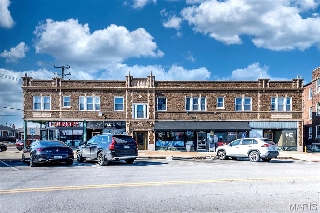 Exceptional opportunity to acquire a 9-unit mixed-use investment property in the highly sought-after Clayton School District, ideally situated in Richmond Heights. Located just steps from SSM Health–St. Mary's Hospital and within walking distance of DeMun, Forest Park, downtown Clayton, and the vibrant amenities of Richmond Heights/Clayton, this property offers an unbeatable combination of location and long-term upside. The asset features established commercial tenants with multi-year leases already in place, providing stable income and reduced turnover risk. Current residential rents are estimated to be $55–$175 below market comparables, presenting an attractive value-add opportunity for investors seeking increased cash flow through future rent growth. Recent capital improvements include a roof that is only four years old, helping minimize near-term maintenance expenses. Additional amenities include front parking for seven vehicles and an expansive 6,273-square-foot basement offering abundant storage or potential for additional income-producing space. With strong tenant demand, excellent walkability, desirable school district access, and significant upside potential, this is a rare opportunity to add a well-positioned mixed-use asset to your investment portfolio.