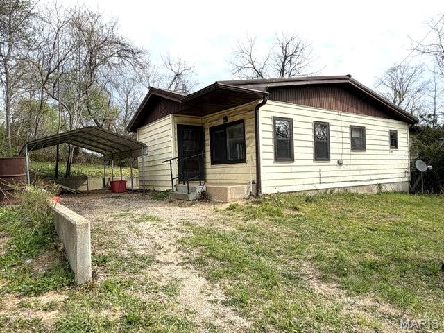 The ''Diamond in the Ozarks'' - Your Eminence Escape Awaits! Whether you're looking for a weekend river basecamp or a full-time project with major soul, this two-bedroom bungalow is ready for its next chapter. Situated in the heart of Eminence, MO, this home has all the ''bones'' of a classic Ozark retreat--it just needs a visionary with a paintbrush and a plan to bring it back to life. The Layout Two Bedrooms: Cozy and functional, featuring non-conforming layouts that add a unique, vintage character to the home. Living & Dining: Separate living and dining rooms provide a traditional flow, perfect for creating a distinct ''homey'' feel once you add your personal touch. Climate Ready: Stay cool after a long day on the Jack's Fork with Central AC, and stay warm through the winter with efficient propane heat. Outdoor Living The Patio: This is the heart of the property. There's a fantastic back patio just begging for a grill, some string lights, and a few Adirondack chairs. It's the ultimate spot for post-river BBQs. Convenience: A one-car carport keeps your vehicle out of the elements or provides extra dry storage for your kayaks and gear. The Location You are minutes away from some of the best natural springs and river floating in the country. This isn't just a house; it's an entry point into the Eminence lifestyle--horses, hiking, and crystal-clear water. THE FINE PRINT: Yes, she needs some love. This is a fixer-upper being sold as-is, making it the perfect opportunity for a flipper, a DIY enthusiast, or someone looking for an affordable way to own a piece of Shannon County. Bring your tools, bring your vision, and make this bungalow shine again!