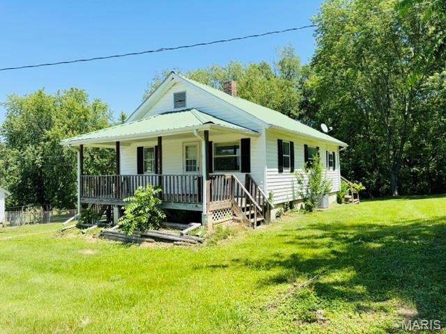 Location, Location, Location!!! Walking distance to Litz Park for pickle ball, fishing, playground and walking trail.  Affordable living with updated floors (no carpet), windows and metal roof plus a large flat backyard. The driveway is on the right side on the house. Seller is offering a $1,000 dollar allowance for updates.