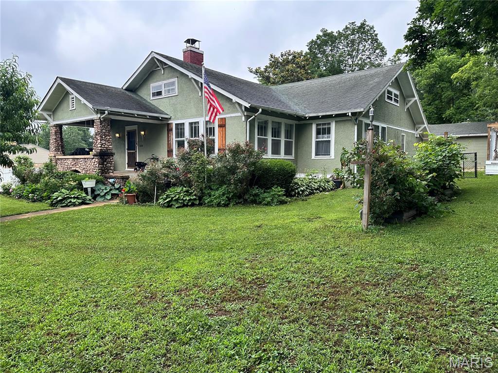 Take a look at this charming 3-4 bedroom, 2-bathroom home located within a short walking distance of downtown Ironton. This property offers a completely fenced yard with plenty of space for pets, including a dog kennel and a separate chain-link area for animals. Enjoy outdoor living with an above-ground pool, hot tub, and even a cold plunge tub on the deck.
The beautifully landscaped yard features peach trees, plum trees, blackberries, grape vines, roses, a stunning water fountain, and a variety of other flowers and plants, creating your own private backyard oasis. A detached one-car garage provides additional storage and parking.
Inside, you'll find several built-in shelves that add character and charm throughout the home. The attic area offers additional space that could be finished into another room, home office, hobby room, or even a movie theater perhaps. Lots of closets for additional storage throughout the home. The home also features a partial unfinished basement with access from both inside the home and an exterior cellar door.
Street and alley access provide added convenience. Located near many of the area's most popular attractions including Shepherd Mountain Bike Park, Elephant Rocks State Park, Johnson's Shut-Ins State Park, and the Black River, this property offers the perfect combination of small-town living and outdoor recreation.
Whether you're looking for a full-time residence, weekend getaway, or investment opportunity, this property has plenty to offer.