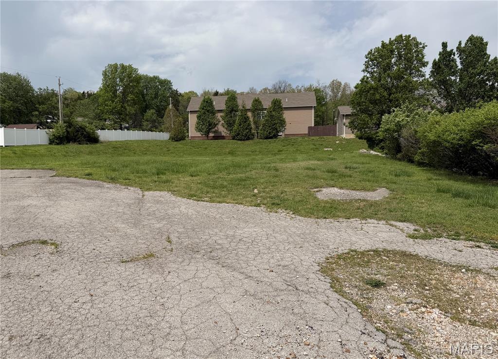 This prime 0.64-acre commercial parcel offers an exceptional opportunity to establish your business in the heart of Eureka, Missouri, with direct visibility and access from the main highway. Positioned in a high-traffic corridor, the property provides outstanding exposure to daily commuters and steady local flow, making it ideal for retail, service, or development ventures. Its manageable size allows for efficient use while still offering flexibility in design and layout. Surrounded by a growing community and established businesses, this site combines convenience, accessibility, and strong market potential—perfect for investors or entrepreneurs looking to capitalize on a strategic, highly visible location.