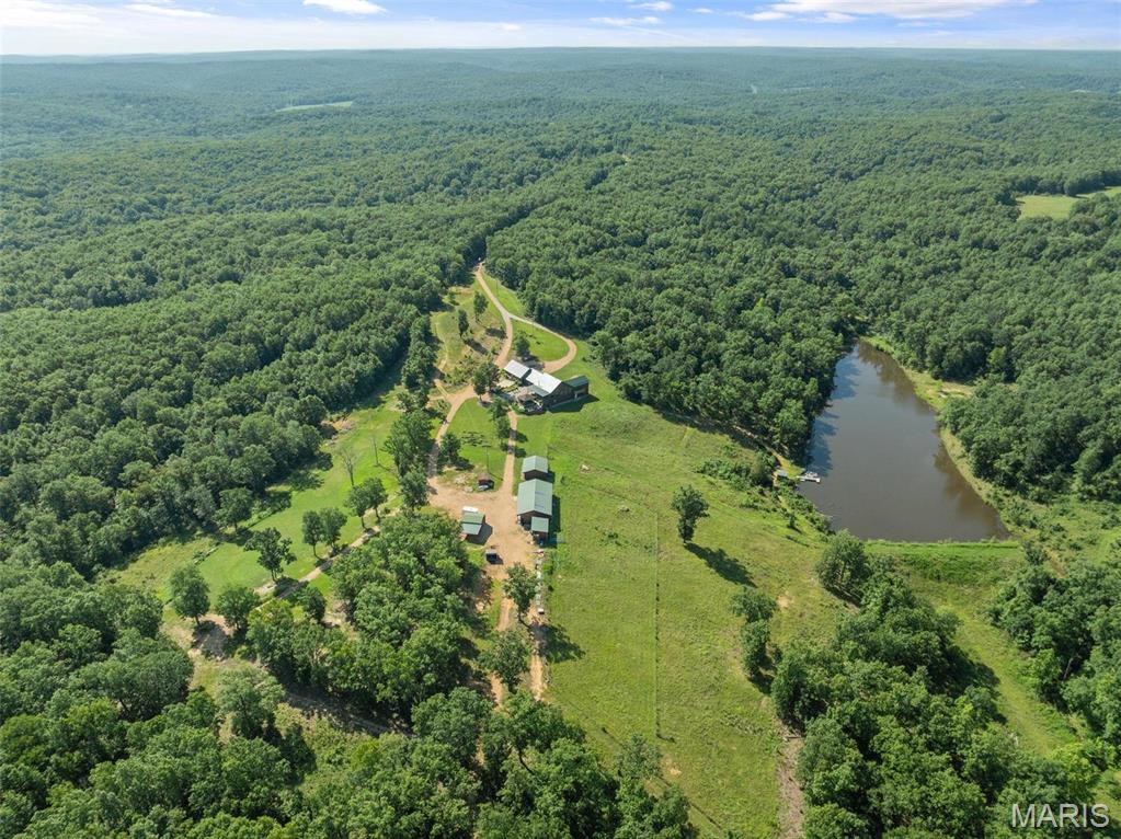 Welcome to Cedar Buck Ranch
This ranch has everything that the outdoorsman could dream of and all the conveniences that his wife could ask for. The ranch has been made into an over-the-top deer and turkey hunting retreat. With the buildings it would make a great home, lodge and/or corporate retreat. The ranch has been very well taken care of and offers so many opportunities for recreation or full time living.  There are miles of trails, deer plots, deer stands and the long driveway from road to the compound leaves you in awe. The lodge overlooks your own 4+/- acre stocked lake and offers incredible views. There is also a very nice par 3 golf hole. This is an absolutely must see and buy first look ranch. The ranch has been incredibly maintained and cared for by super great owners who love the place. Priced very fairly at $1,774,000.
Show Inst: 
By Appointment Only, Call Listing Agent, listing agent to accompany for showings, Text Listing Agent, proof of funds required for showing