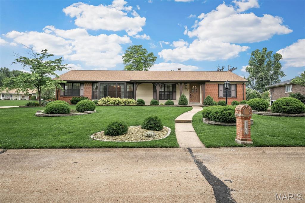 One owner OVERSIZED ranch home on a 1/3 acre level corner lot in Concord Village and Lindbergh Schools. This well maintained brick home features over 3300sqft of living space and has SO much potential. The main floor boasts almost 2400sqft by itself. Inside, an entry foyer greets you leading to the formal living and dining rooms, bay windows, family room with built in wet bar and cabinetry, french doors, and wood burning fireplace. A large addition in 1992-93  includes a gigantic kitchen with a huge center island, custom cabinetry, recessed lighting and large breakfast room. The master is spacious with his/hers walk in closets, and an en-suite bath with 2 sinks and shower. Two additional bedrooms are located on the main floor along with an updated hall bath. The finished lower level features a game room with pool table that stays, large wet bar, second large recreation area and full bath. The yard is flat with a patio. There is a 2 car side entry garage. This one has the potential to have the modern open floor plan that today's families desire in a fantastic neighborhood. Zoned hvac, intercom and sprinkler system.