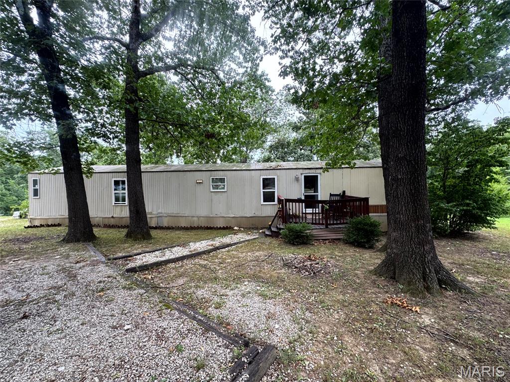 Welcome to peaceful country living with built in investment potential! This updated 924 sq.ft. single wide home sits on just over 3 acres of beautiful land featuring mature trees, a scenic pond, and plenty of room to enjoy the outdoors. 
The property includes a fenced backyard, perfect for pets or play along with a large outbuilding offering ample storage, workshop space, or room for hobbies. 
Currently tenant occupied through NECAC, this property provides immediate rental income for investors. Whether you're looking to expand your investment portfolio or searching for an affordable place to call home with acreage and privacy, this property offers outstanding potential. 
Don't  miss this opportunity to own a versatile country property with space, income potential and room to grow.