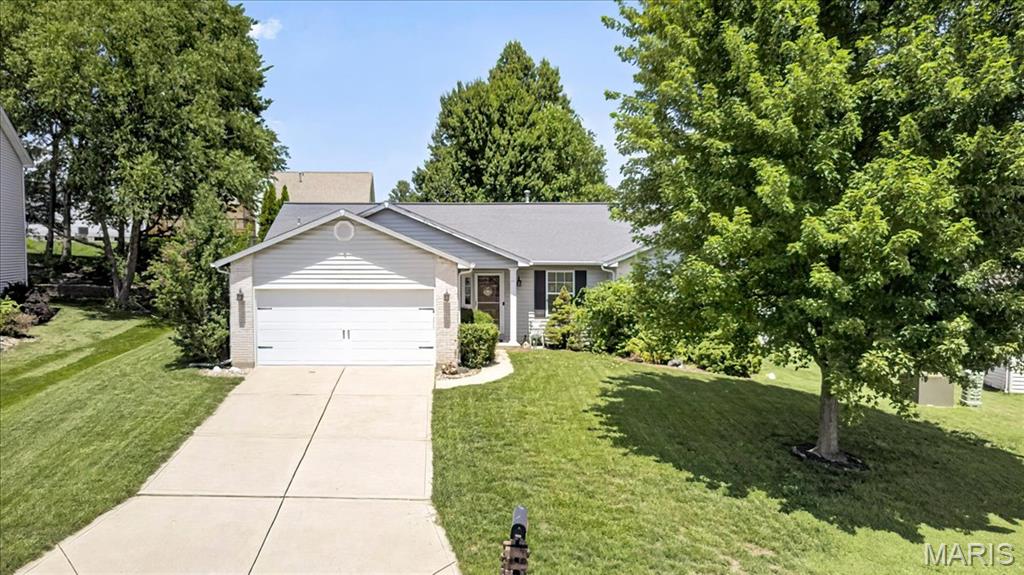 Welcome home! As you step inside this adorable open concept home, you are greeted by the light and bright family room that includes a beautiful wood burning fireplace. The updated kitchen flows into the breakfast room complete with a bay window. The spacious vaulted primary bedroom includes an attached full bathroom and walk-in closet. Two generously sized bedrooms and full bathroom round out the rest of the main floor. Outside is the patio and fully fenced yard (2021) perfect for entertaining. Don't forget the attached two car garage and main floor laundry that add to this homes conveniences .  This house is walking distance to Castlio Elementary and has easy highway access. Come check it out today!