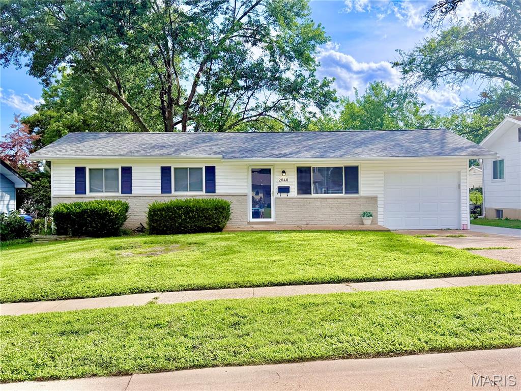 Welcome to 2040 David Drive in Florissant! If you're looking for a home where all the hard work has already been done, this is it. Nearly every major component of this home has been updated within the last month, making it truly move-in ready. Step inside to find beautiful real hardwood floors throughout the main level, professionally refreshed to showcase their timeless appeal. The extensive renovation includes new luxury vinyl plank flooring in the finished basement, new bathroom flooring, new carpet on the stairs, updated sinks, and brand-new kitchen appliances.

The big-ticket items are already taken care of with a new roof, new HVAC system, and new water heater, giving buyers valuable peace of mind. Additional upgrades include a newly poured concrete patio, bonus driveway, and attic fan for added comfort and efficiency. The main floor offers 3 bedrooms and comfortable living spaces designed for everyday living, while the finished lower level provides even more flexibility with a spacious recreation area and an additional sleeping room or bonus room perfect for guests, a home office, gym, or hobby space. Premium luxury vinyl plank flooring throughout the basement creates a clean, modern look and ties the space together beautifully.

Outside, enjoy a large fenced backyard with plenty of room for pets, play, gardening, or entertaining. Combined with excellent curb appeal, extensive recent updates, and a convenient Florissant location, 2040 David Drive offers the rare opportunity to own a home that feels almost brand new without the new construction price tag. Schedule your showing today!