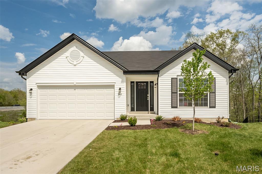 Why wait to build when you can move right into this beautifully upgraded former display home? This Aspen II model has been meticulously maintained and offers the perfect blend of style and comfort. Featuring 3 bedrooms, 2 full baths, and a 2-car garage, this ranch home is designed for easy living.

The spacious kitchen is a true highlight, complete with stainless steel appliances, quartz countertops, and plenty of room for gathering and entertaining. Vaulted ceilings enhance the open, airy feel throughout the main living space, while main-floor laundry adds everyday convenience.

The walk-out basement provides a clean slate, ready for your custom finishing touches - ideal for expanding your living space or creating the perfect recreation area. This move-in ready home showcases quality, care, and thoughtful upgrades throughout.