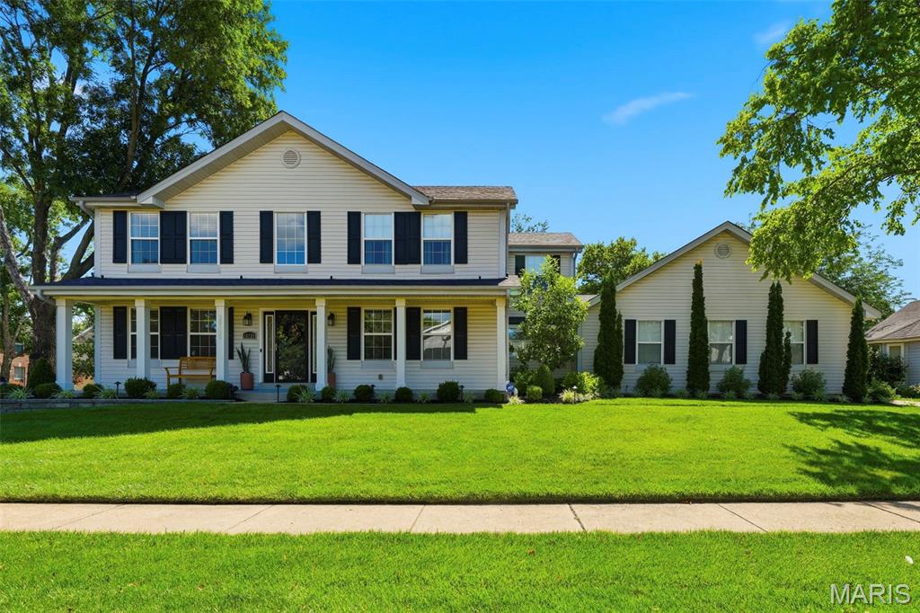 THIS HOUSE IS GORGEOUS!! Corner lot, rear-entry 3 CAR GARAGE and perfect curb appeal!  Enter this UPDATED BRIGHT OPEN floor plan to find:  2 sty foyer;  separate dining & living room; family room w/gas fireplace, bay window; spacious kitchen w/ breakfast bar, custom cabinetry, granite countertops, stainless steel appliances w/induction stove and double oven, center island, additional countertop space, garden window, pantry, recessed lighting and eat-in area; half bath and laundry room w/utility sink, all on the main level.  Upper level includes; primary bedroom suite - large bdroom w/vaulted ceiling, walk-in closet - full bath w/ceramic tile floor, tub/sep shower, linen closet, double vanity; 3 additional bedrooms w/overhead lighting; full bath w/dbl vanity. Beautiful flat fenced backyard w/deck. Additional updates include: wood flooring thruout main flr, 6 panel doors, newer baseboards, newer roof, hvac systems, water heater, professional landscaping + outdoor lighting, sprinkler and security systems, newer light fixtures and hardware throughout, exterior shutters and newer fence.  Awesome 3 car garage updates include: new side-opening garage door openers, garage door tracks relocated vertically for additional clearance, new storage shelving, fully refinished drywall, ceiling, baseboards and paint.  Neighborhood amenities include clubhouse, pools, tennis and basketball courts, lake, walking trail and excercise area.  Rockwood Schools.