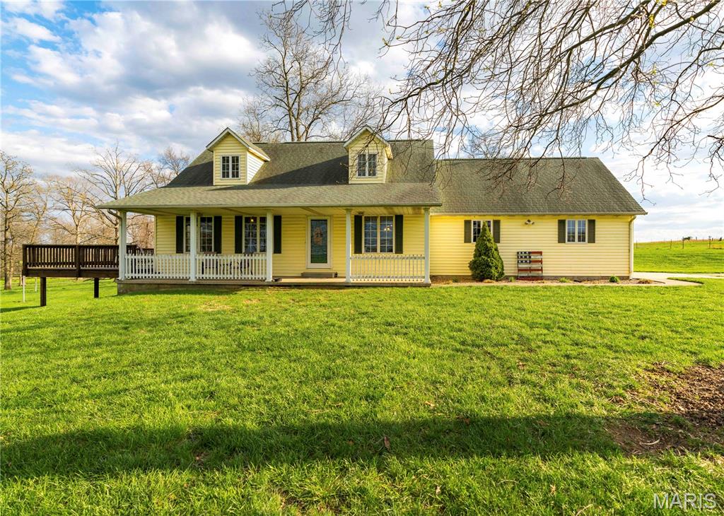 70 ACRES!! 60 x 61 BARN w 6" CONCRETE FLOOR!! 2 1/2 ACRE STOCKED LAKE!! LAND GREAT FOR CROPS, LIVESTOCK OR HUNTING!...On these 70 Acres sits a stunning 4 bedroom, 3 bath home estate set with a whole house generator.   This beautifully designed home offers a grand family room with a stunning floor to ceiling stone fireplace, vaulted ceiling, gorgeous views of the property, a bedroom used as a spacious office area, large kitchen with a new backsplash, gleaming hardwood floors, master bedroom on main level and much more! Step outside and unwind in the peaceful surroundings, perfect for evening relaxation or entertaining guests. The property also includes a large shop, ideal for storing your mower, tractor, tools, and outdoor equipment. Whether you're looking for a space to spread out or simply a quiet retreat, this home offers the best of country living with all the modern comforts! Make an appointment today to see the Farm and Home today.   (Home, shop and 6.23 acres available for $479,900.)