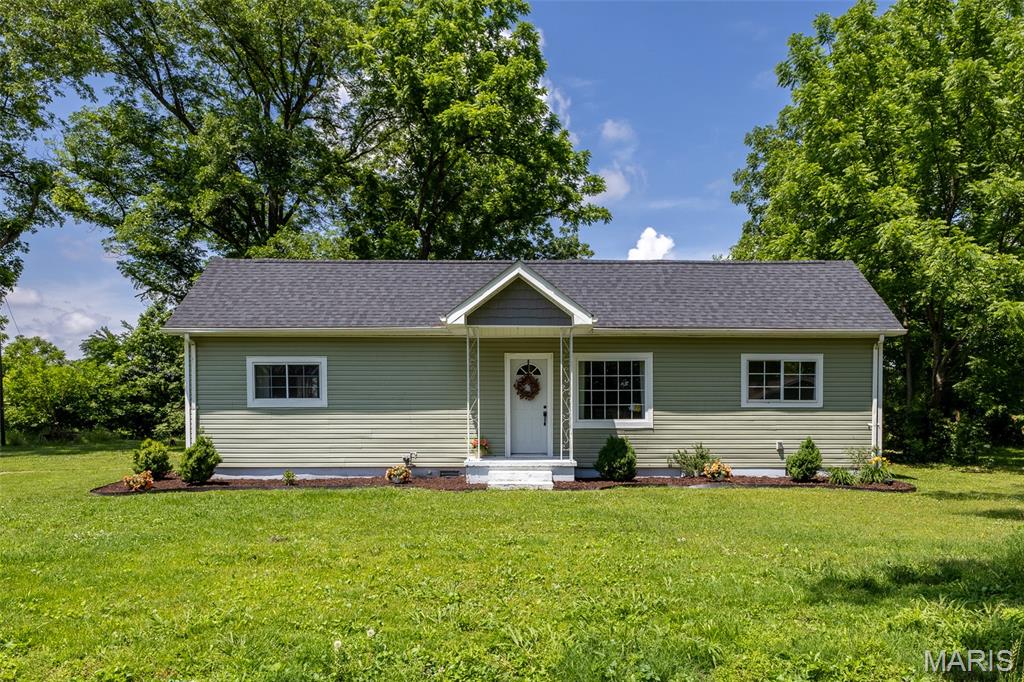 Nestled on 1.5 Acres M/L in the desirable Poplar Bluff School District and Lake Road Elementary area, this beautifully 4-bedroom, 2-bath home offers 1,722 sq. ft. of country charm with modern updates. Featuring 9-foot ceilings, a spacious layout, and views of surrounding farmland, this property is perfect for those seeking peaceful country living with room to grow. Recent improvements include a new roof just one year ago, fresh landscaping, and tasteful remodeling throughout.
Outside, you’ll find endless possibilities with a 40x45 barn ideal for chickens, livestock, storage, or hobbies, plus a fenced dog pen in the backyard. The large yard is perfect for gardening and outdoor entertaining, complete with mature walnut and pecan trees that add beauty and shade to the property. A unique grain bin offers incredible potential to transform into an outdoor entertaining area, playhouse, workshop, or one-of-a-kind event space.
Enjoy the convenience of town while embracing the tranquility of rural living in this versatile property filled with character, functionality, and opportunity.