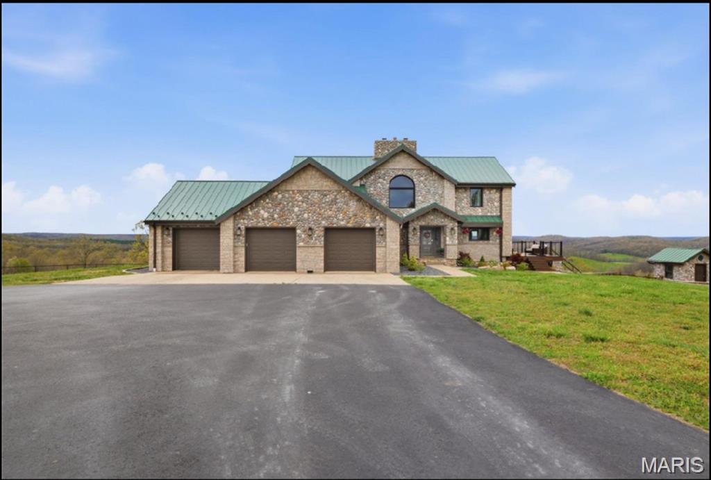 Discover an extraordinary opportunity in Southeast Missouri: a breathtaking almost 800-acre ranch estate that perfectly blends luxury living, agricultural potential, and unmatched privacy.

At the heart of the property sits a stunning almost 6,000SF custom stone and timber home, thoughtfully designed with timeless craftsmanship and modern comforts. From its expansive living spaces, 20’ cathedral ceilings to its refined finishes, the 5 bed 5 bath residence offers both elegance and functionality—ideal for entertaining guests or enjoying the ranch and peaceful country living.

A standout feature of the property is the remarkable 26,000SF climate controlled, fully equipped sports complex—perfect for recreation, training, events, or repurposing to suit your vision (originally built as an indoor roping arena). In addition, the ranch includes multiple meticulously maintained shops and storage facilities, ensuring exceptional organization and functionality for day-to-day operations.

Built with serious ranching in mind, the property is outfitted with well-maintained cattle working equipment, steel pipe fences, ponds, lakes, spring fed year-round streams, making it turnkey for livestock management and agricultural production.

The land itself is a rare find—almost 800 contiguous acres of rolling terrain featuring a mix of open pasture, wooded areas, and natural beauty. Perfect for cattle, horses, hunting, or recreation, the property offers endless possibilities for agricultural use or a private retreat and borders over 14,000 acres of the Mark Twain National Forest. 

Located in the scenic landscape of Southeast Missouri wine country, this ranch delivers both seclusion and accessibility, making it a true legacy property.

Photo and Video Link (copy and paste into browser) - https://listings.studio724photography.com/sites/rojkbmpv/unbranded

This is more than just a ranch estate—it’s a place to build a future, create memories, and invest in a lifestyle few properties can match and would take over a lifetime to reassemble.