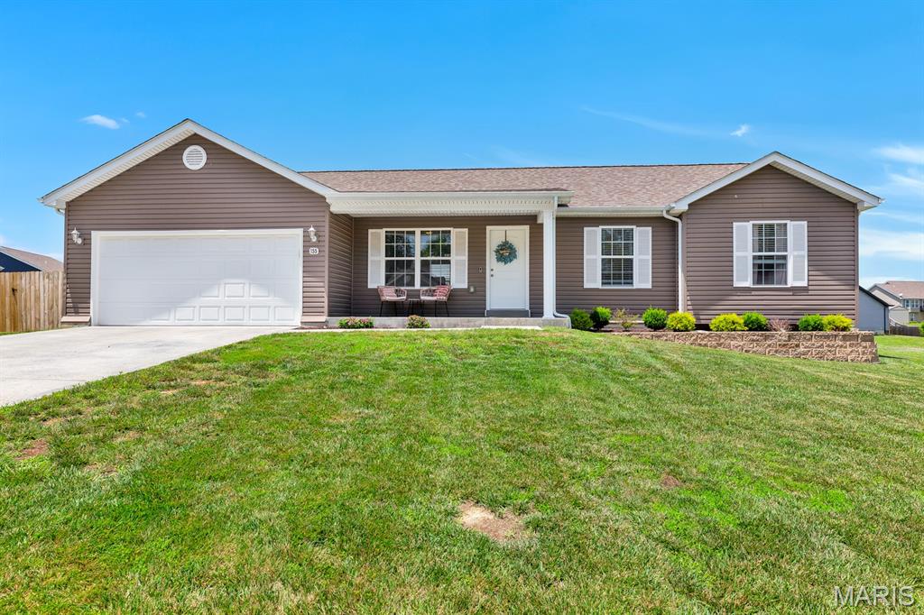 Beautifully maintained and sitting on a large corner lot make this fantastic ranch a must see! From the large backyard with privacy fence and covered back porch to open concept floor plan with main floor laundry make this home a real showstopper! The partially finished lower level is just icing on the cake! Make your showing appointment today!